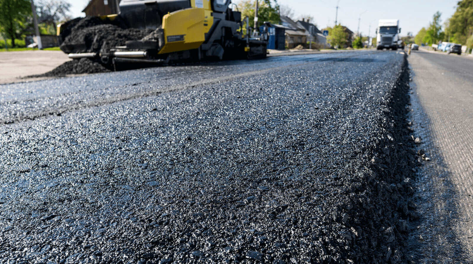 Paver laying new asphalt